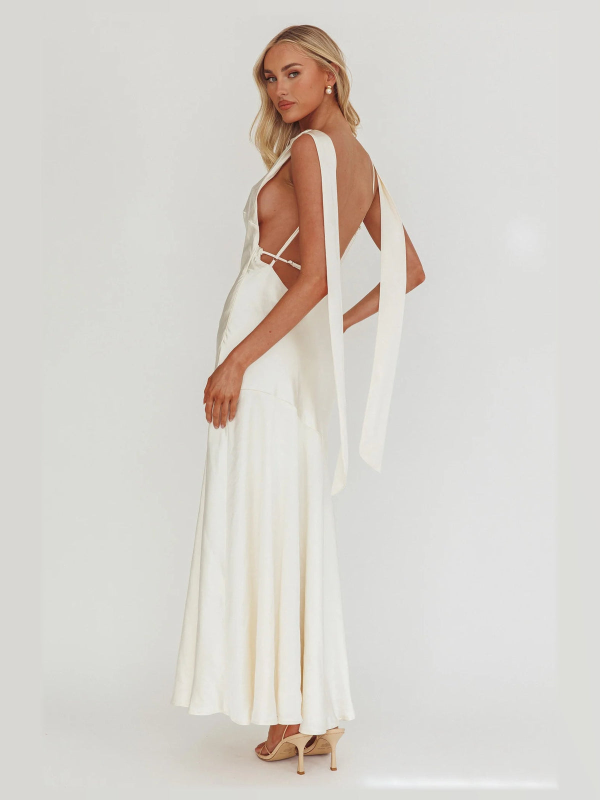 Cream maxi formal dress, back full-length view showing the bodice