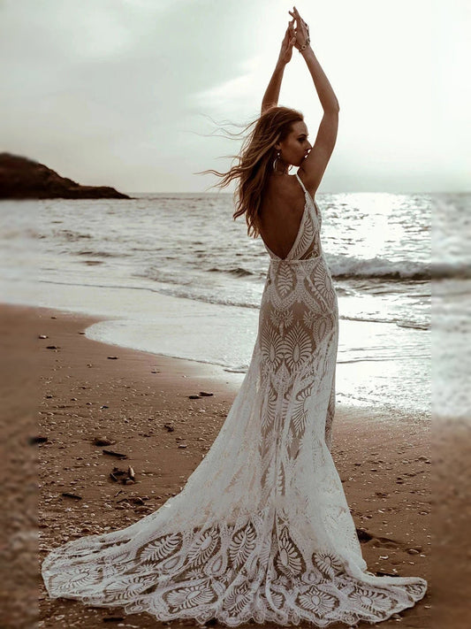 Ivory lace mermaid wedding dress with deep V back and train