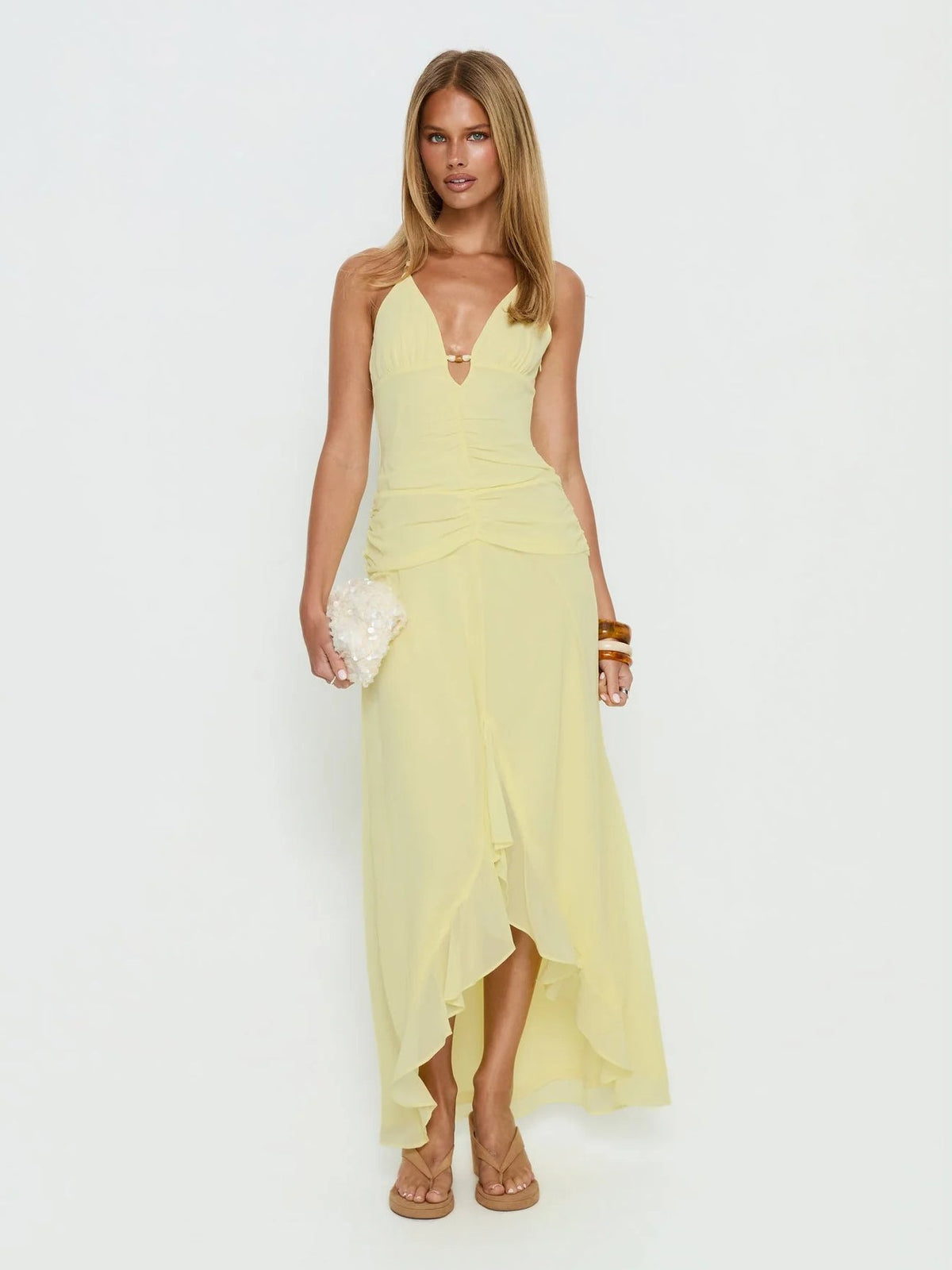 Yellow formal dress with halter neck neckline