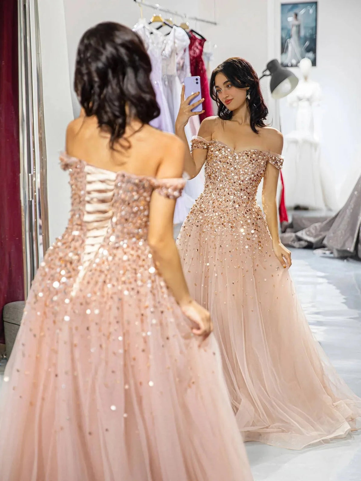Champagne ruffled off-shoulder corset dress with sequined bodice and tulle skirt