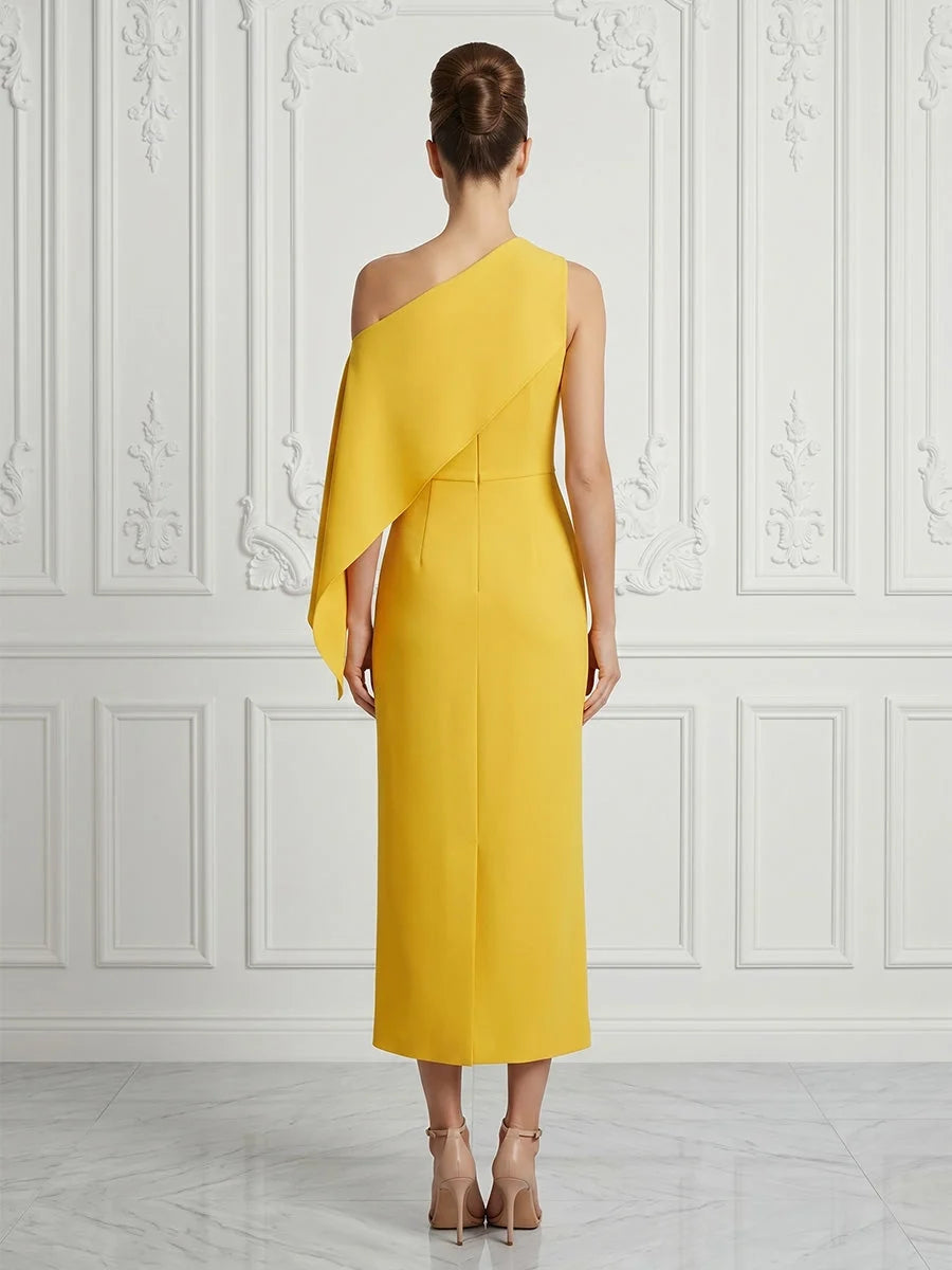 Yellow one-shoulder midi sheath dress, back view with draped diagonal detail