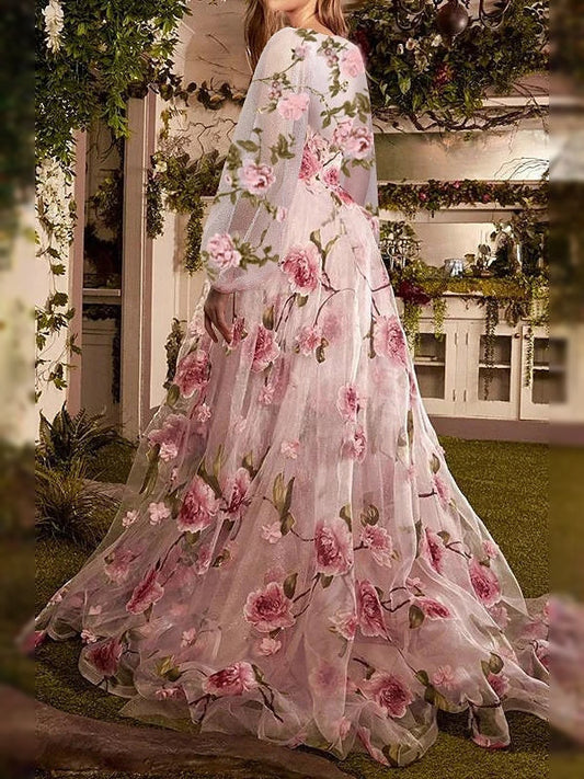 Pink floral A-line prom dress with illusion neckline, long sleeves, open back and side slit