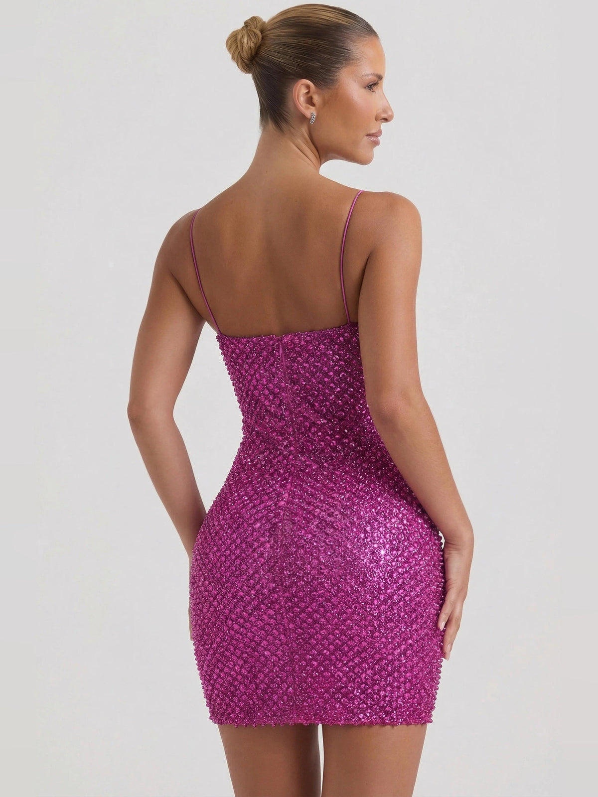 Magenta sequin mini dress, open back with spaghetti straps, fitted