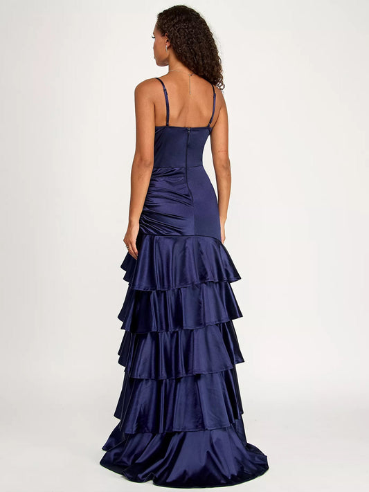 Back view of navy satin corset A-line dress with crisscross tie straps and tiered ruffles