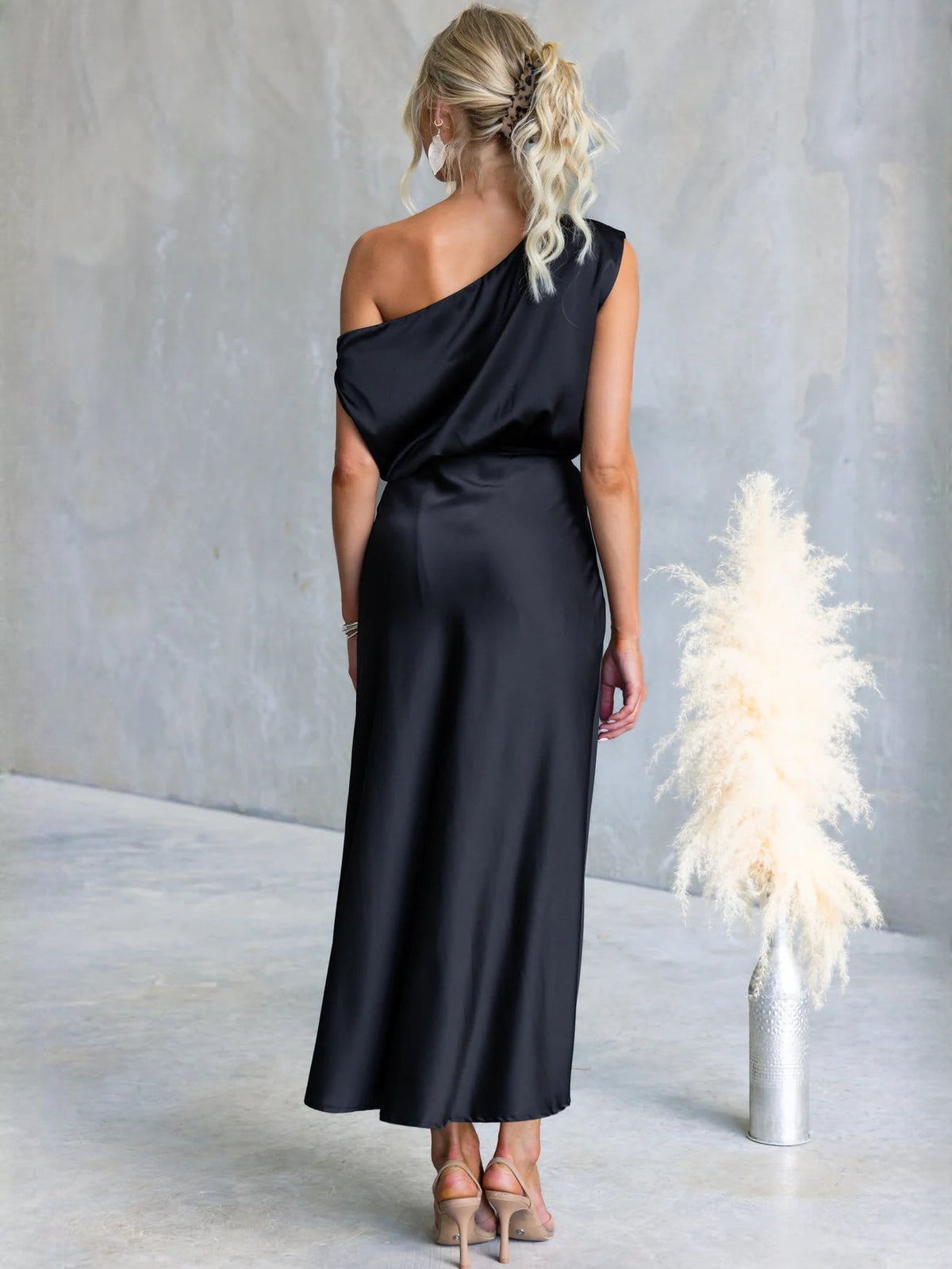 Black sheath maxi formal dress with draping, full-length back view