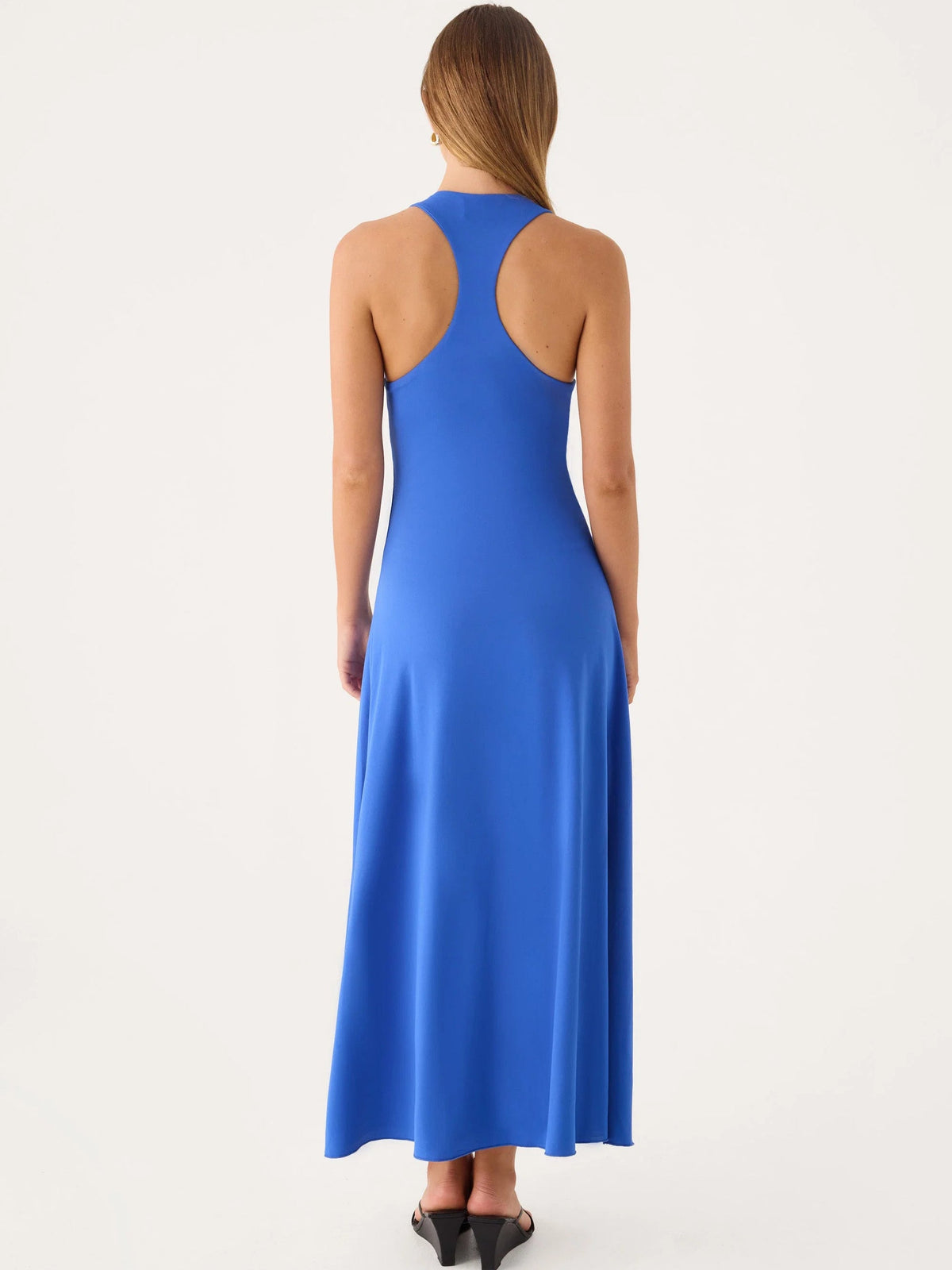 Cobalt blue midi formal dress with open-back racer straps and asymmetrical high-low hem