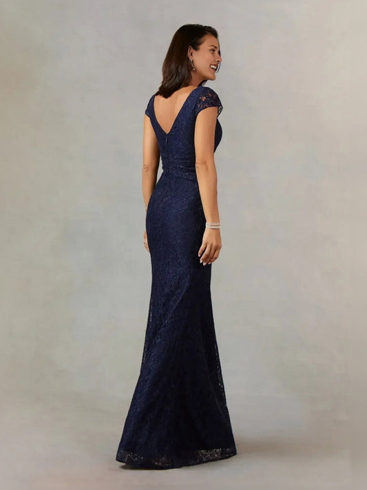 Dark navy textured mermaid gown with V-neck, cap sleeves, and front slit, side view