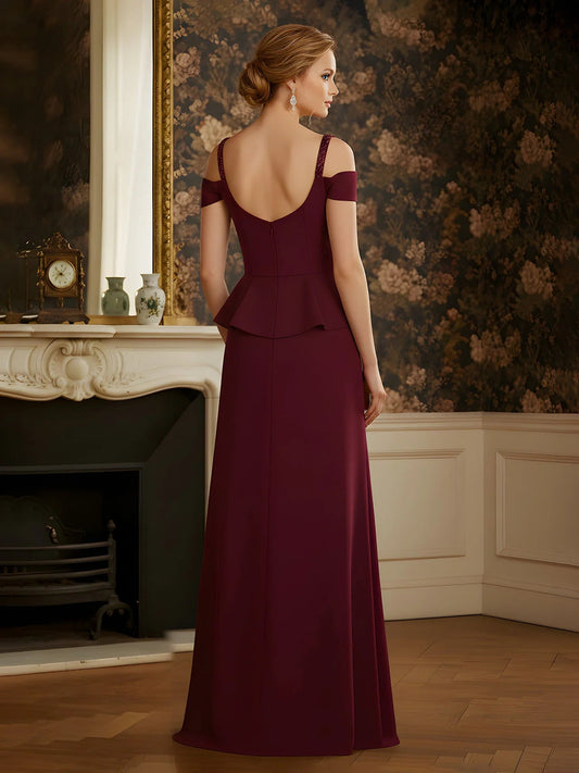 Burgundy sleeved A-line mother-of-bride gown with low open back and beaded waist