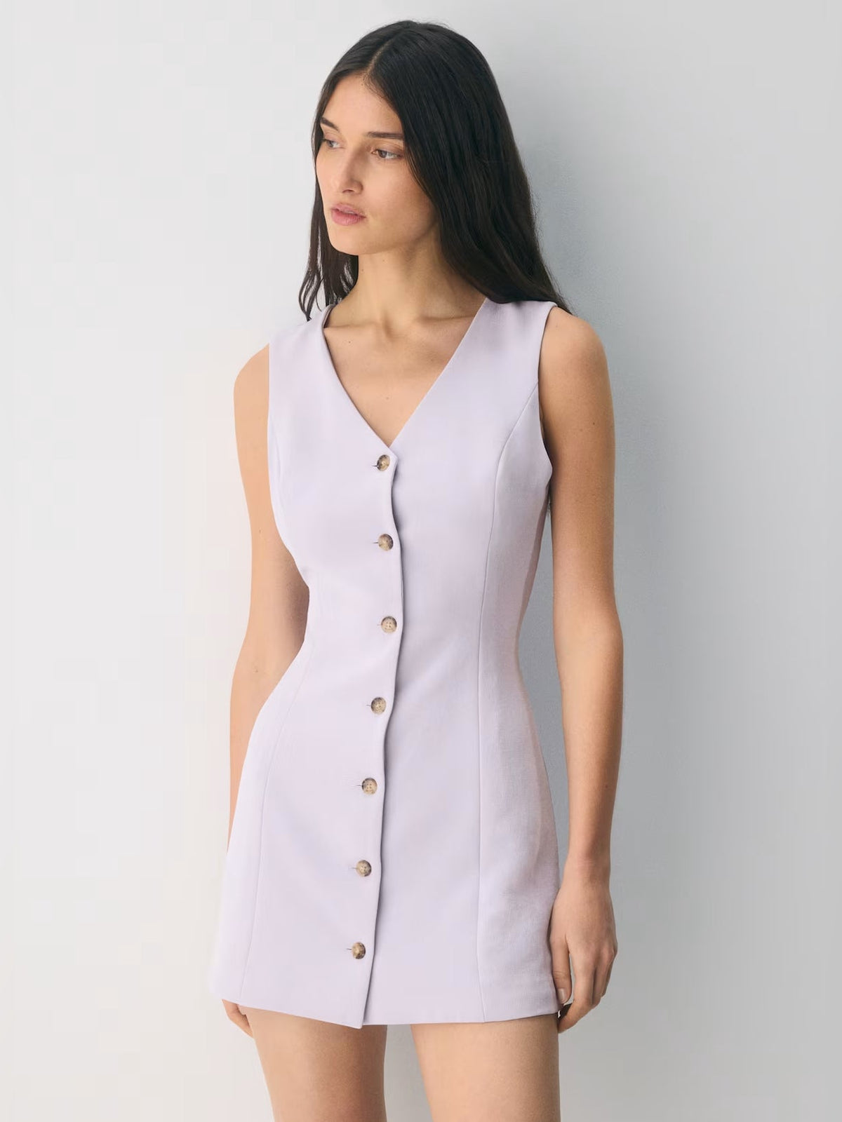 Lavender mini crepe homecoming dress with sleeveless V-neck and button front