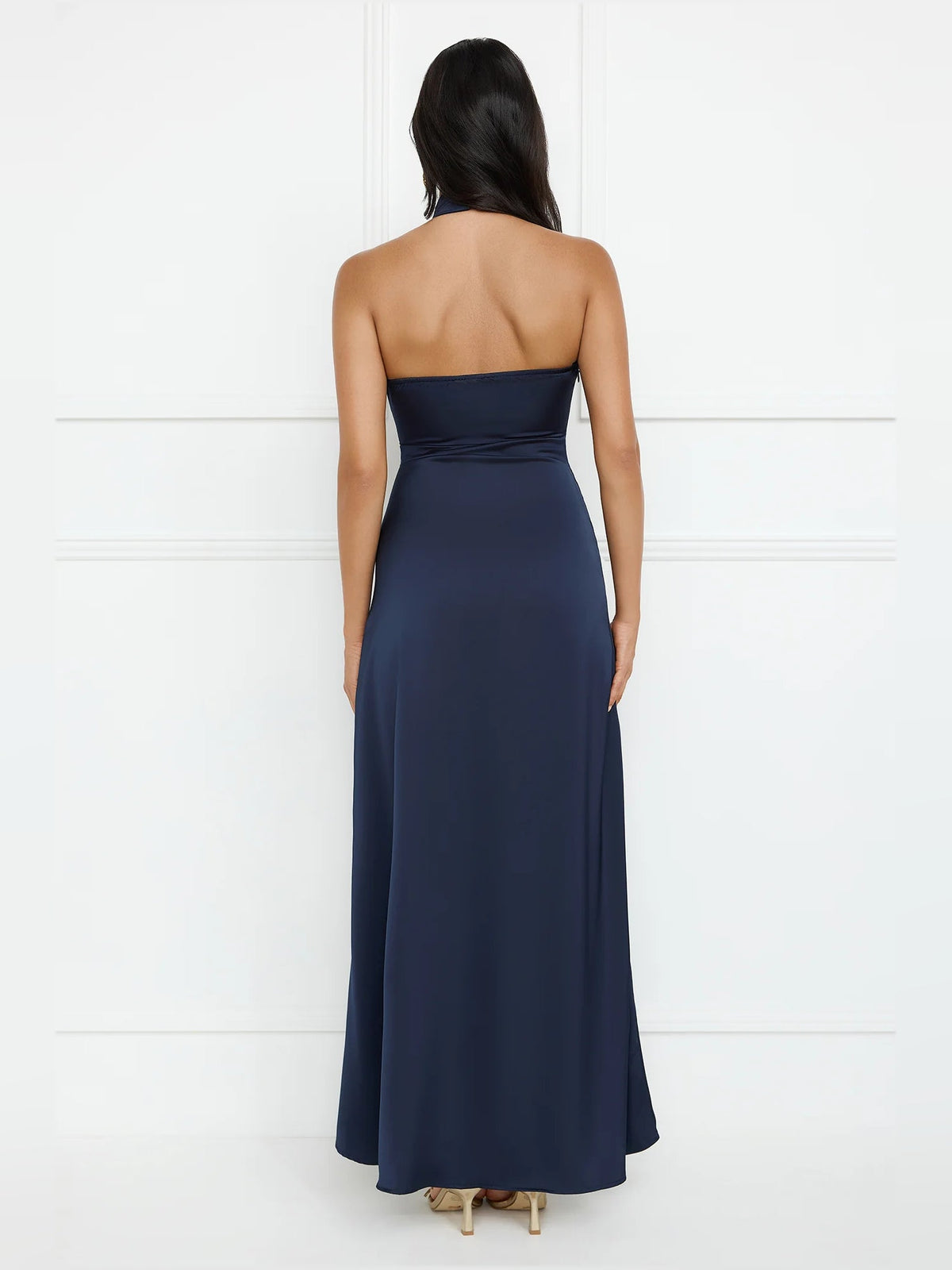 Navy sheath maxi formal dress with skirt slit, full-length back view