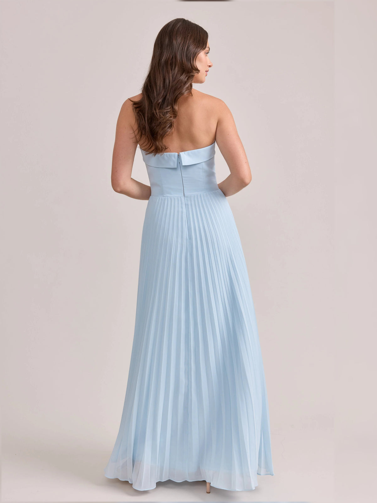 Light blue strapless A-line maxi chiffon dress, pleated skirt, back view from side