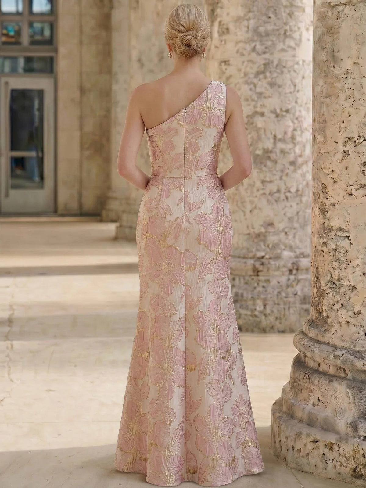 Back view: ruched one-shoulder floral sheath dress, open back, front slit, floor-length