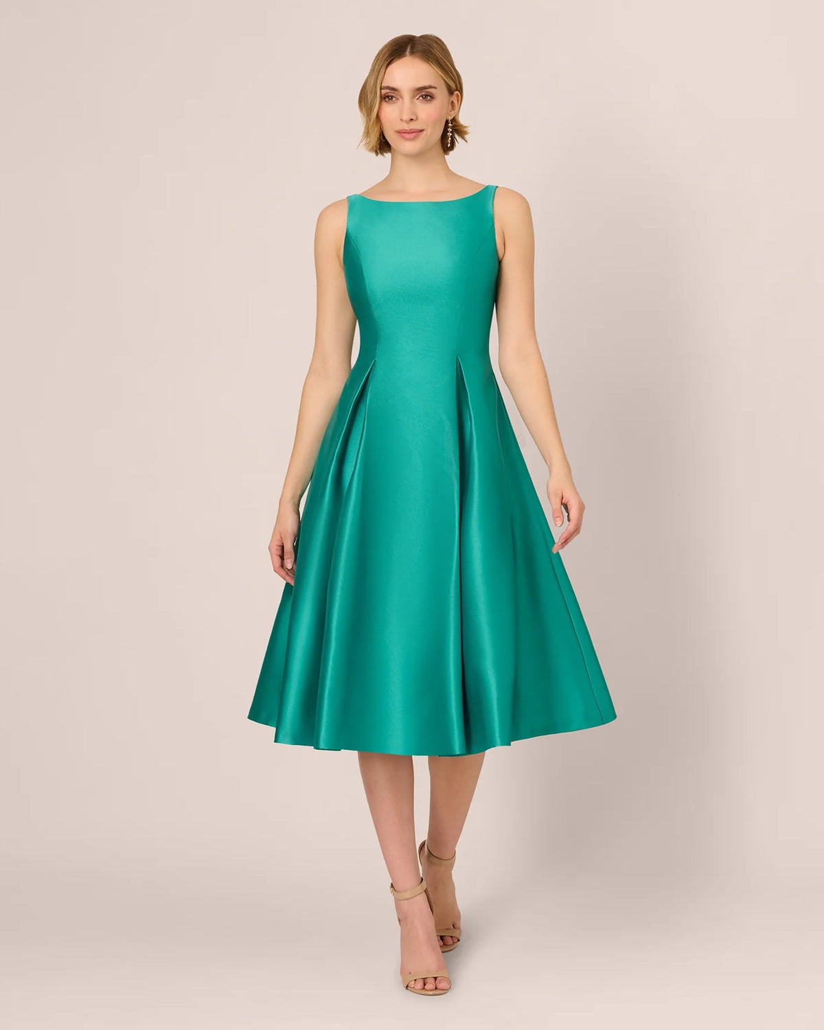 Emerald green sleeveless fit-and-flare midi dress, scoop neckline, flared pleated skirt