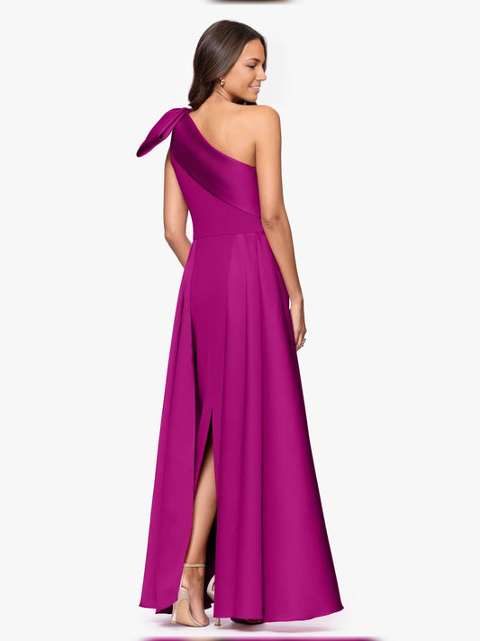 Purple one-shoulder sheath dress with draped bow at back, side slit, floor-length