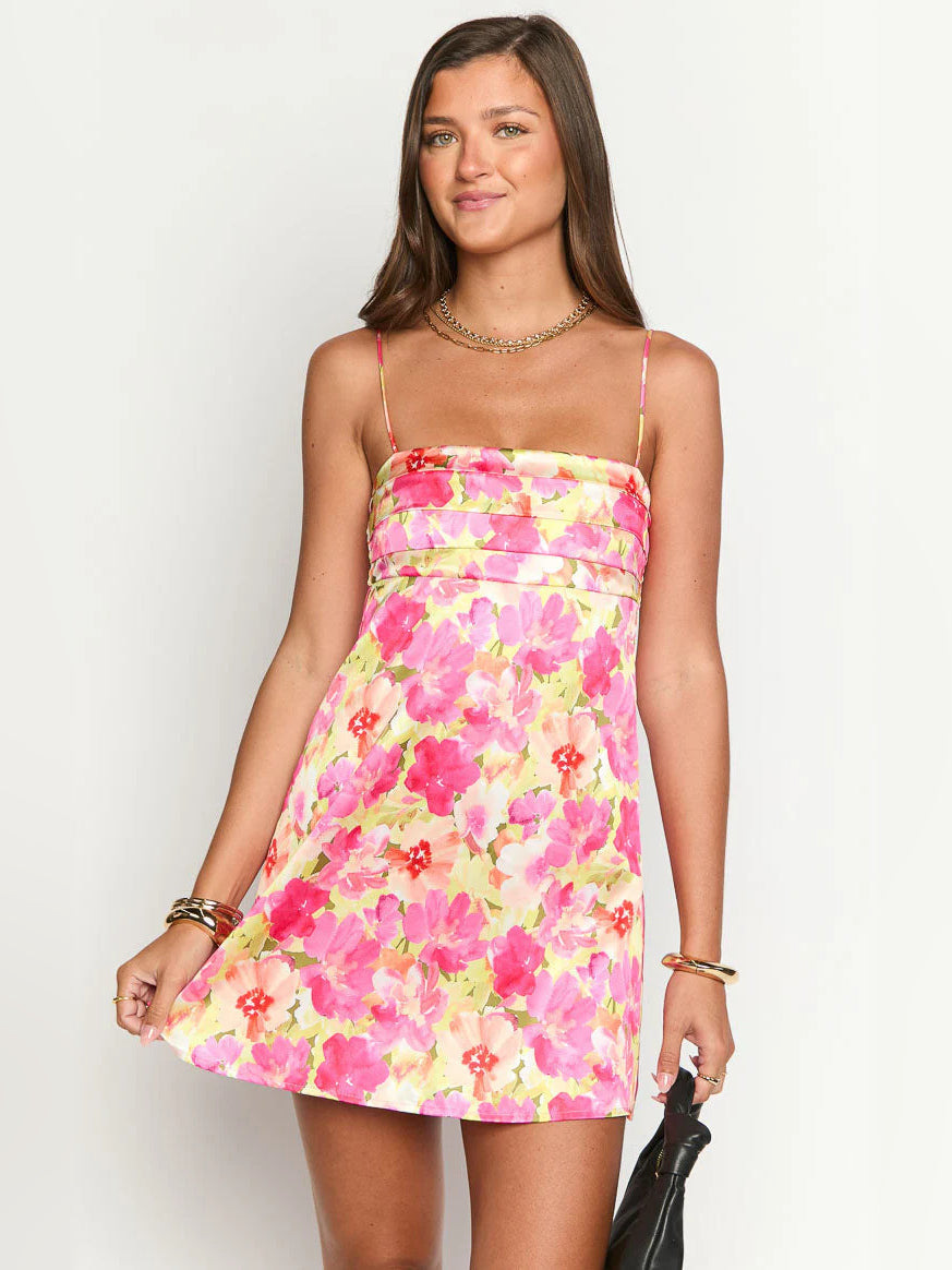 Pink and yellow floral mini dress with spaghetti straps and straight, bandeau-style neckline