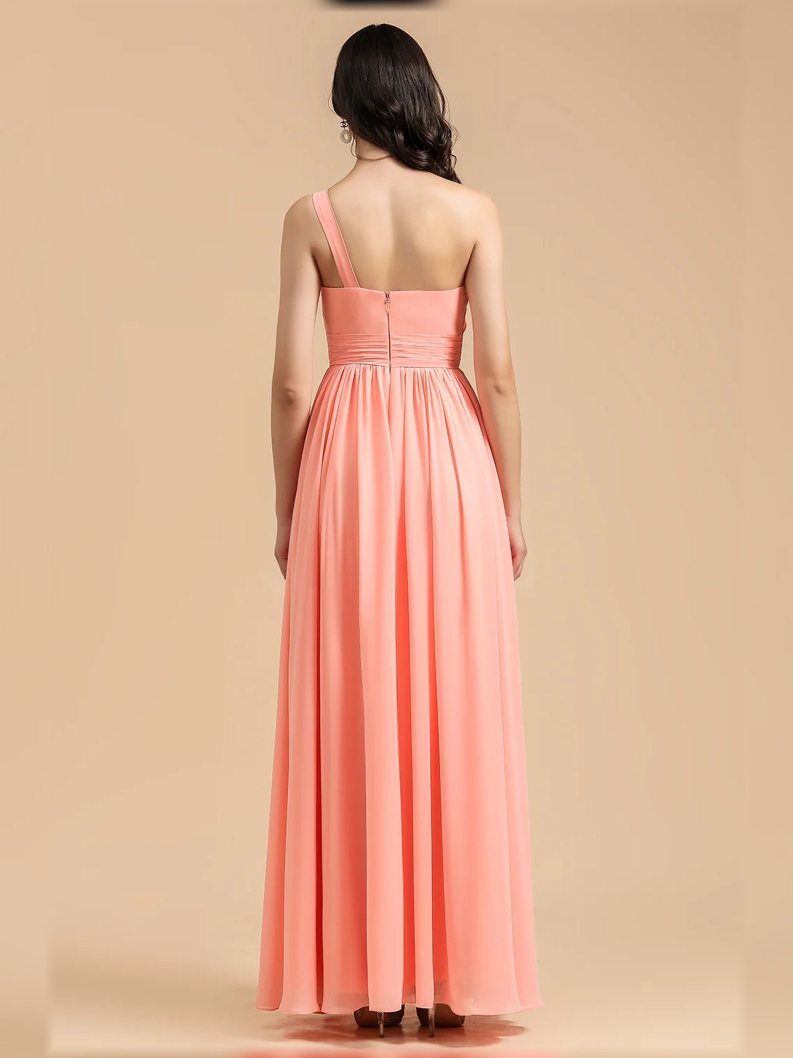 Coral one-shoulder pleated A-line chiffon maxi dress, back view.