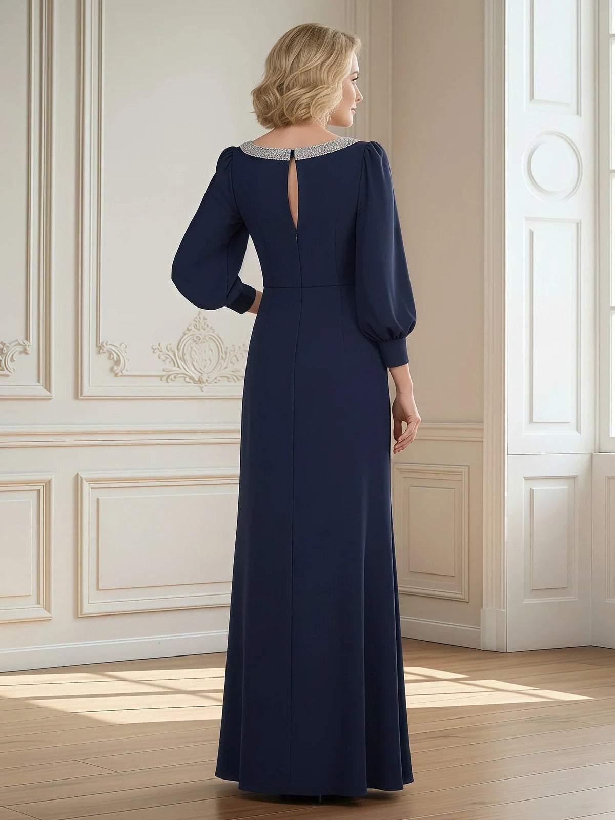 Navy long-sleeve sheath dress with open back and floor-length side slit