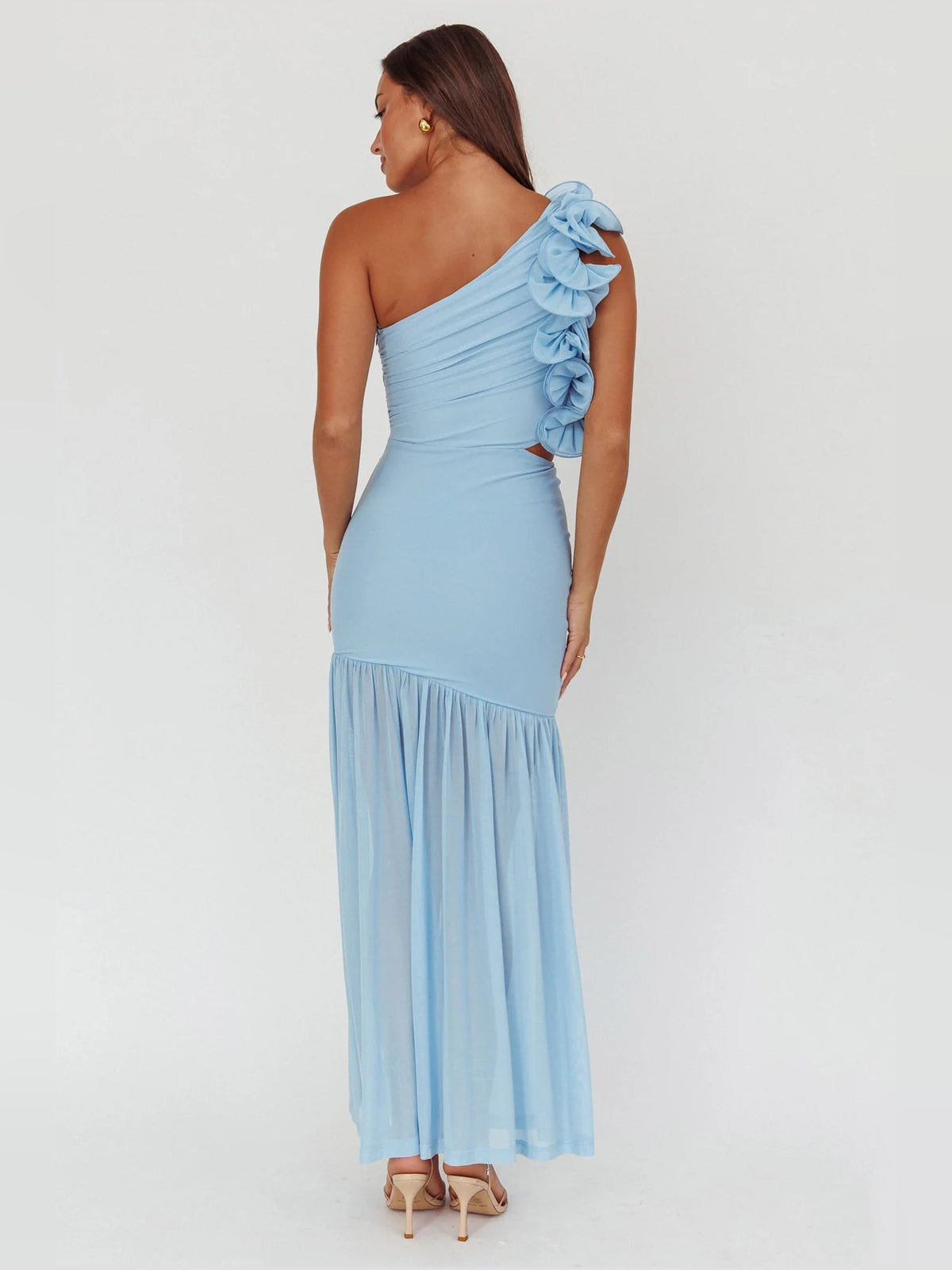 Light blue one-shoulder maxi dress with large shoulder rosette and tiered skirt, side cutout