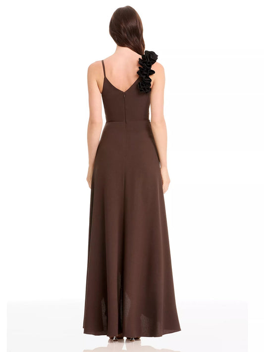 Back view of chocolate-brown one-shoulder formal dress with ruched bodice and long skirt