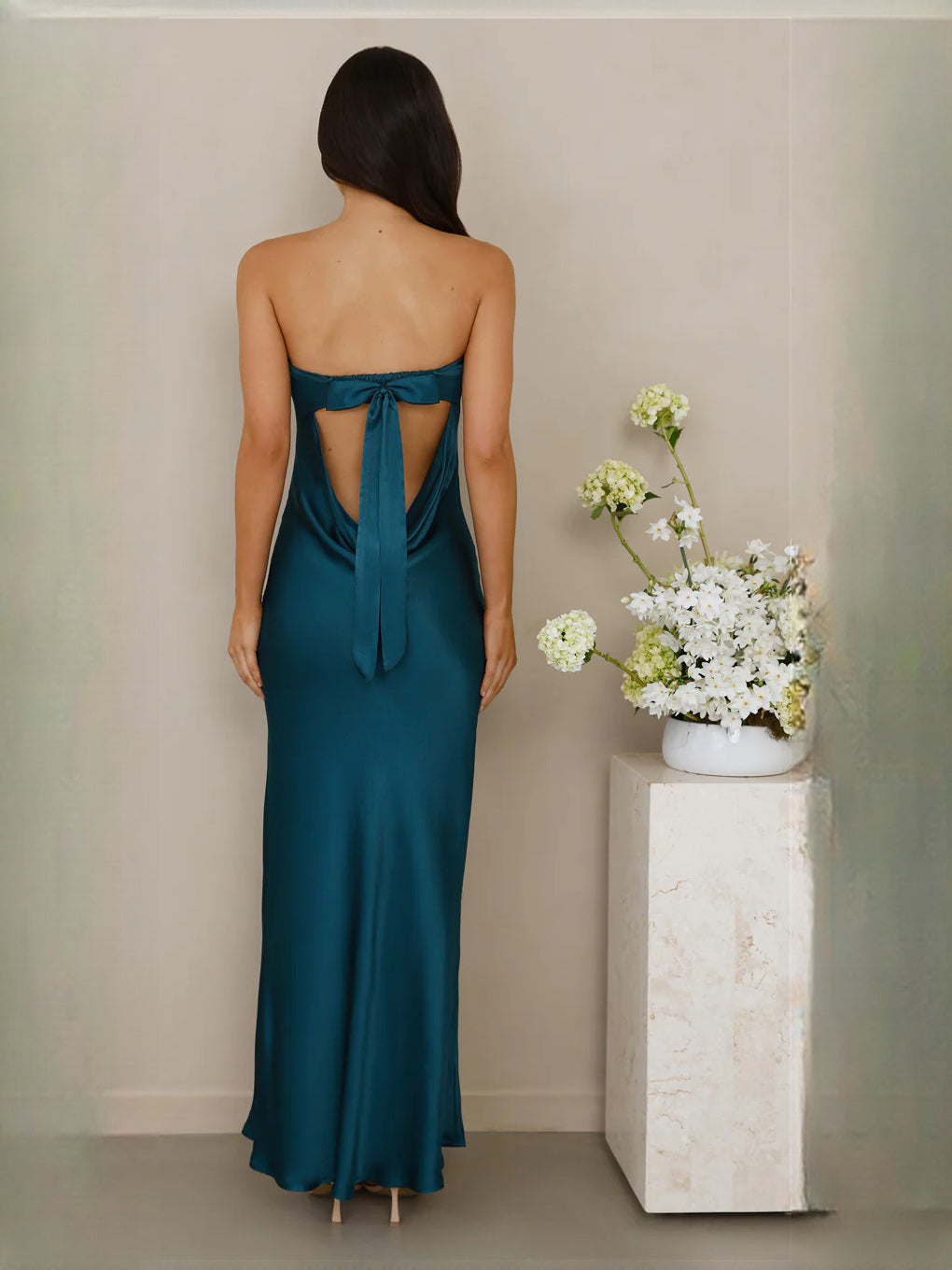 Teal sheath maxi formal dress with bow detail, full-length back view