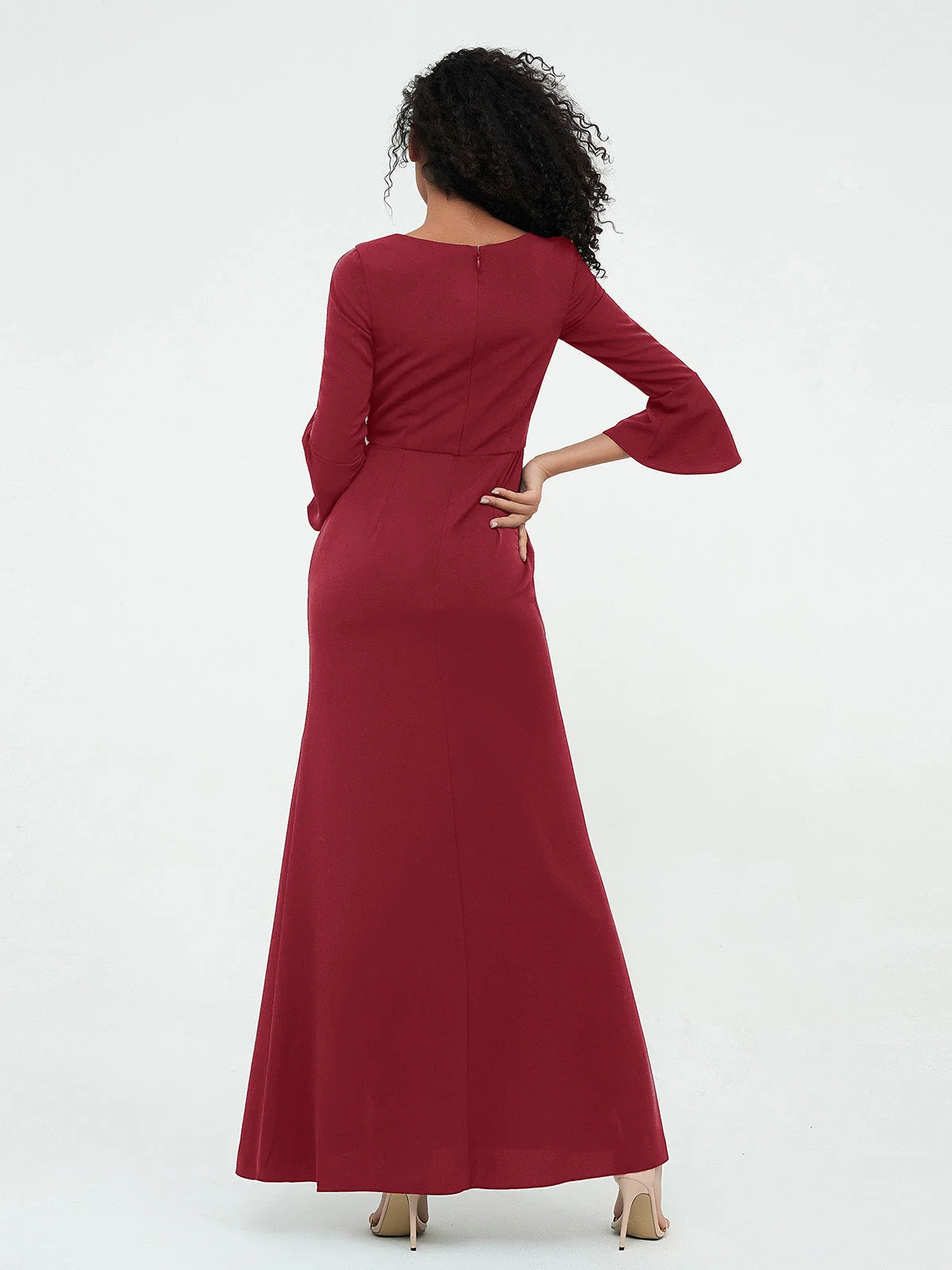 Burgundy long-sleeve formal dress, back view, belted waist and floor-length skirt