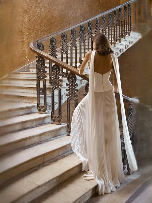 Ivory strapless satin A-line wedding dress, pleated draped back and floor-length skirt
