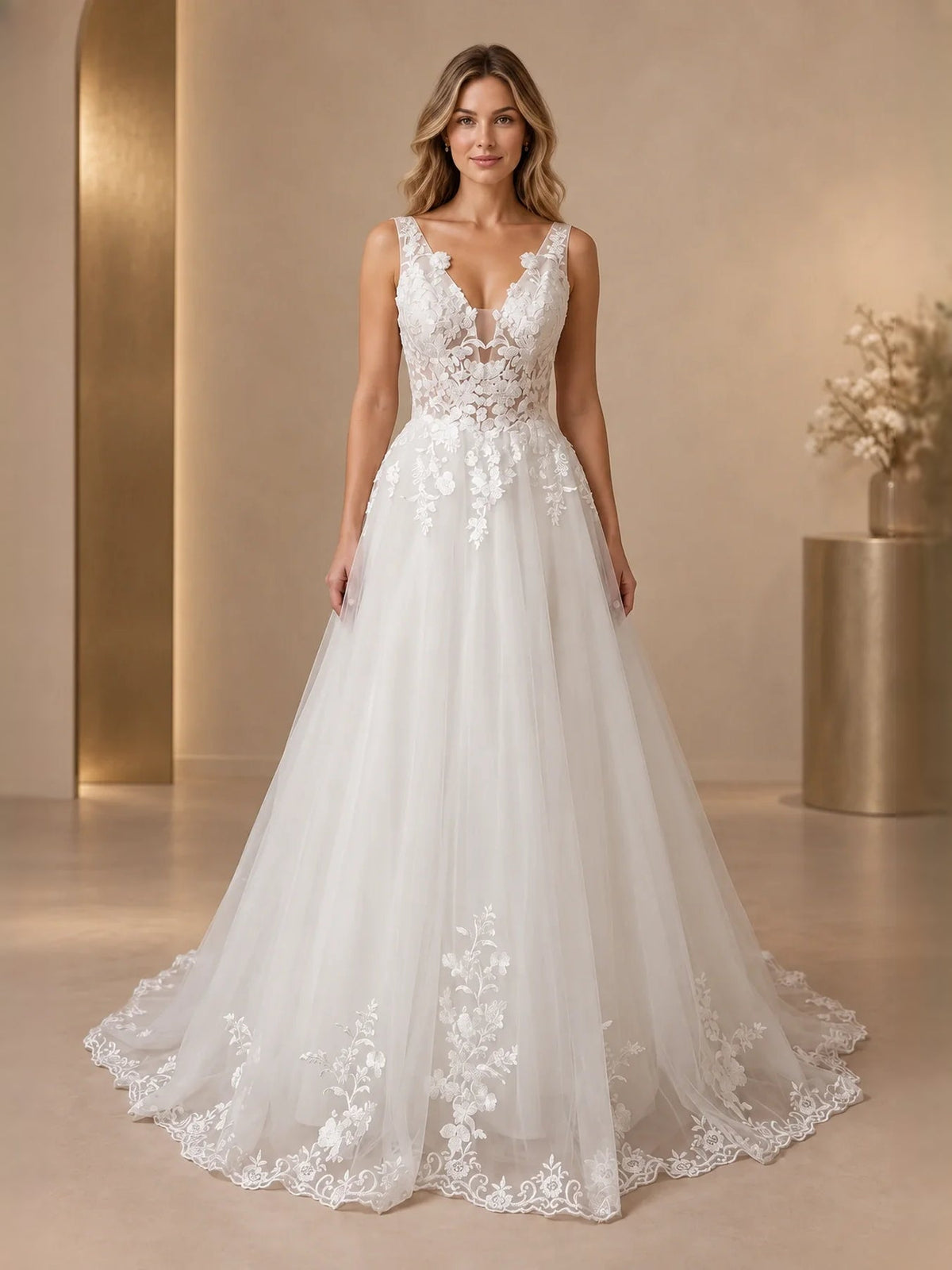 Ivory sleeveless V-neck A-line wedding dress with layered tulle skirt and floral appliques
