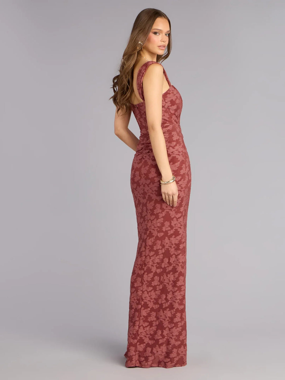 Burgundy square-neck corset dress, sleeveless, floor-length floral print, side view