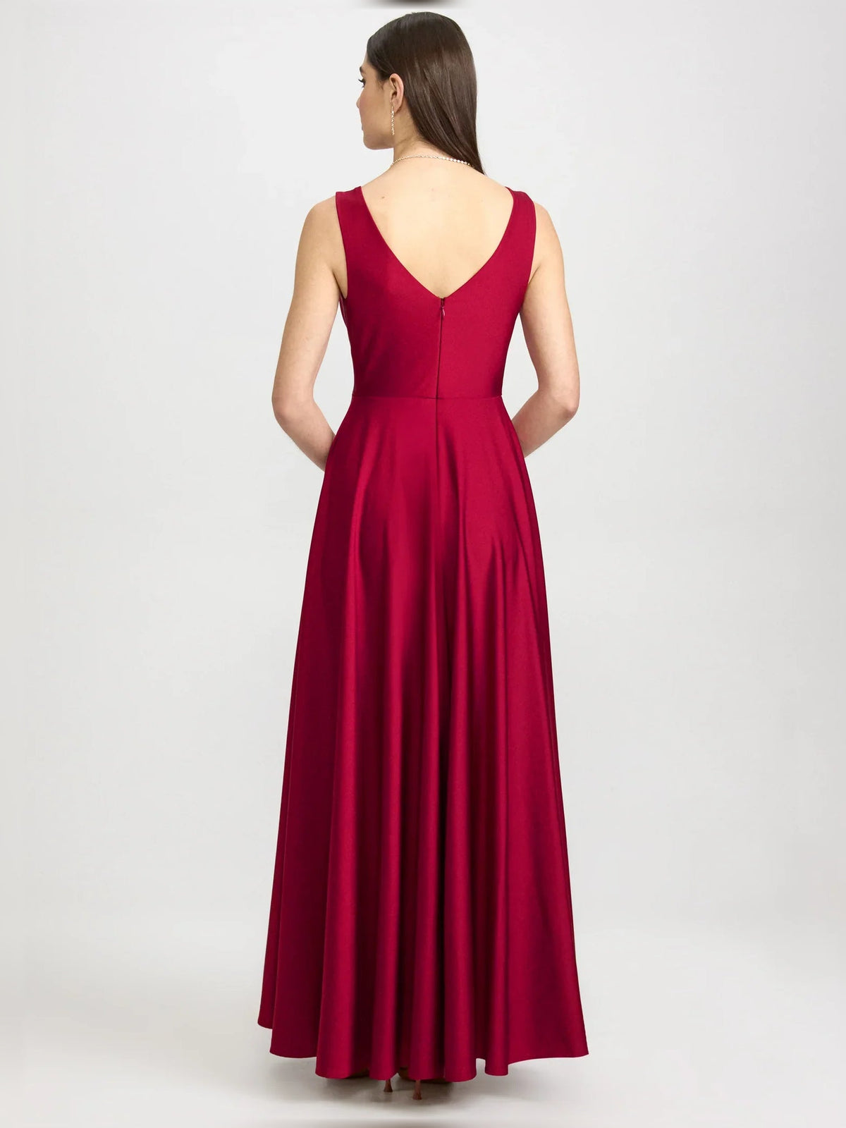 Red V-neck ruched floor-length formal dress, sleeveless back view with gathered skirt