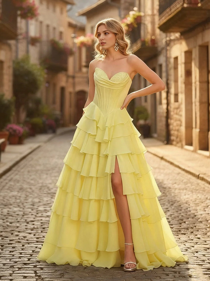 Canary-yellow sweetheart A-line prom dress with layered ruffle skirt and side slit