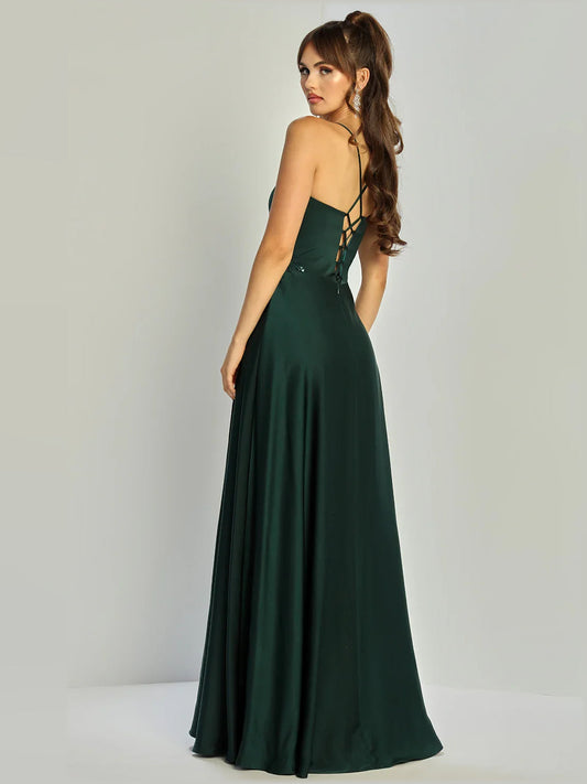 Dark green formal dress with crisscross back spaghetti straps and beaded waist full skirt