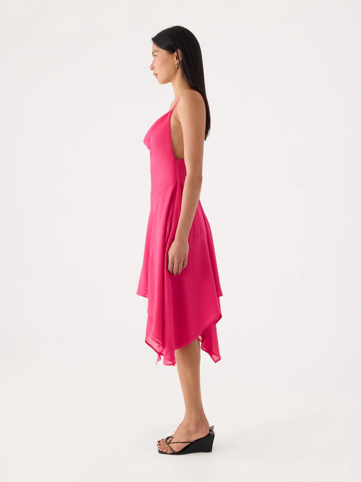 Fuchsia sleeveless midi formal dress with asymmetrical hem, side view