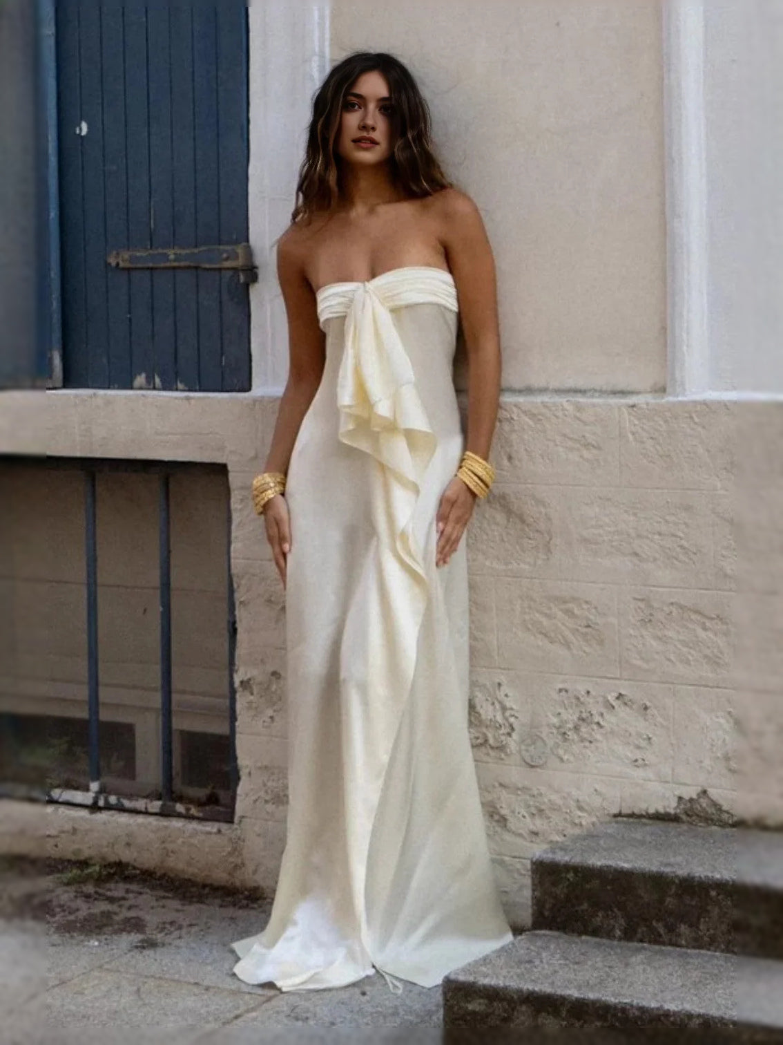 Ivory strapless satin sheath prom dress with draped bow and high side slit