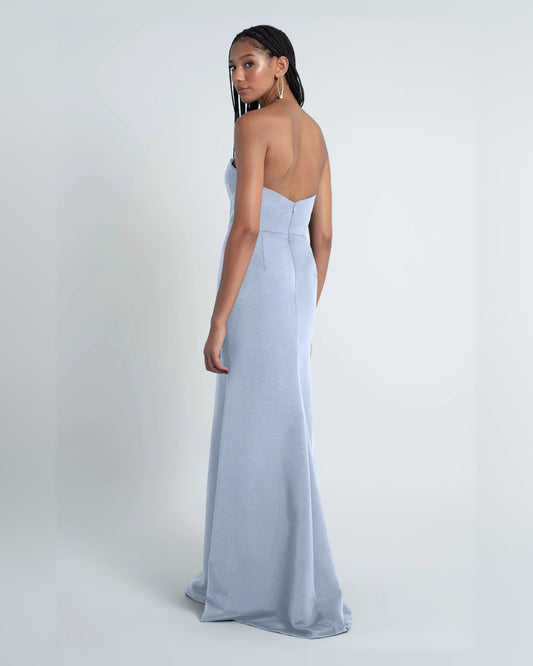 Light blue strapless A-line maxi dress, side view, fitted bodice and floor-length skirt