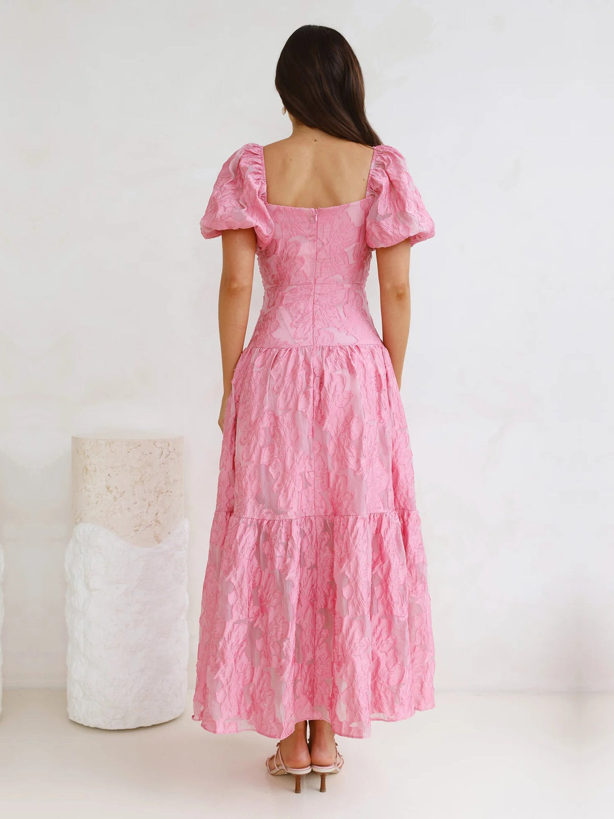 Pink back view tiered maxi dress with square neckline and puff sleeves