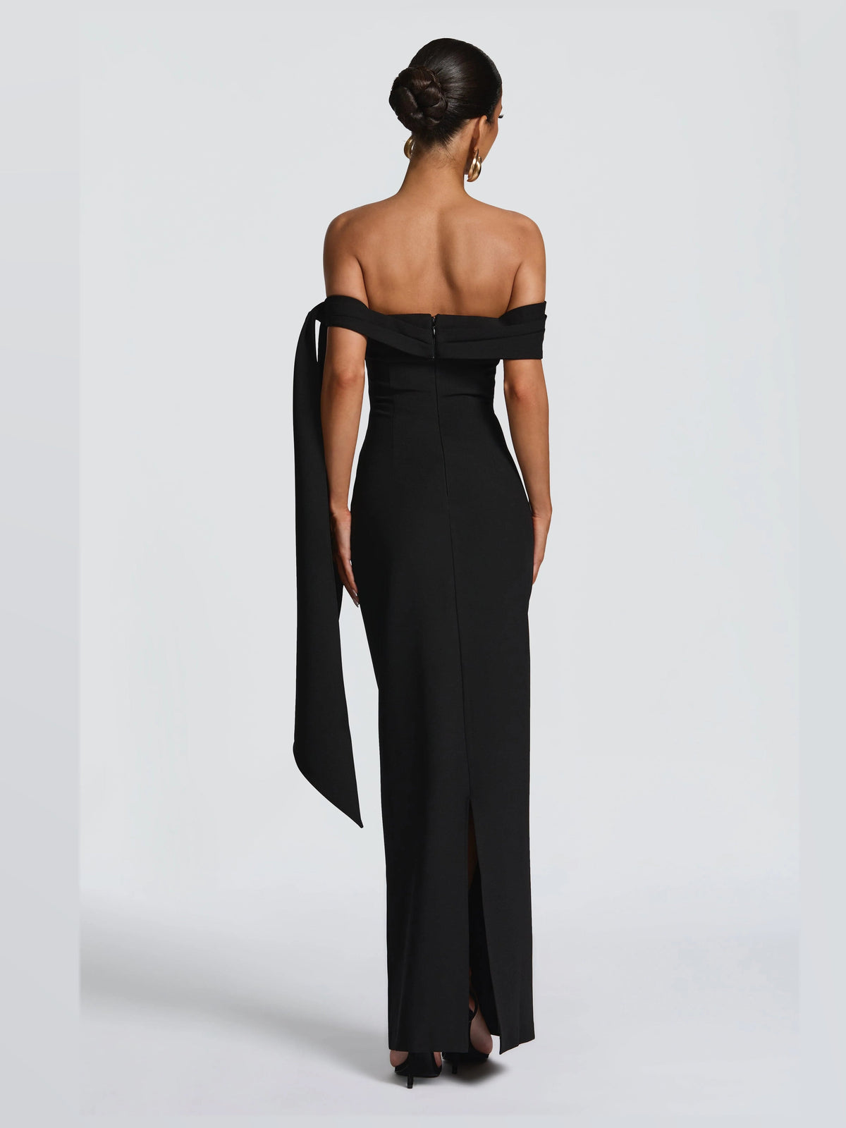 Black maxi formal dress, back full-length view showing the bodice