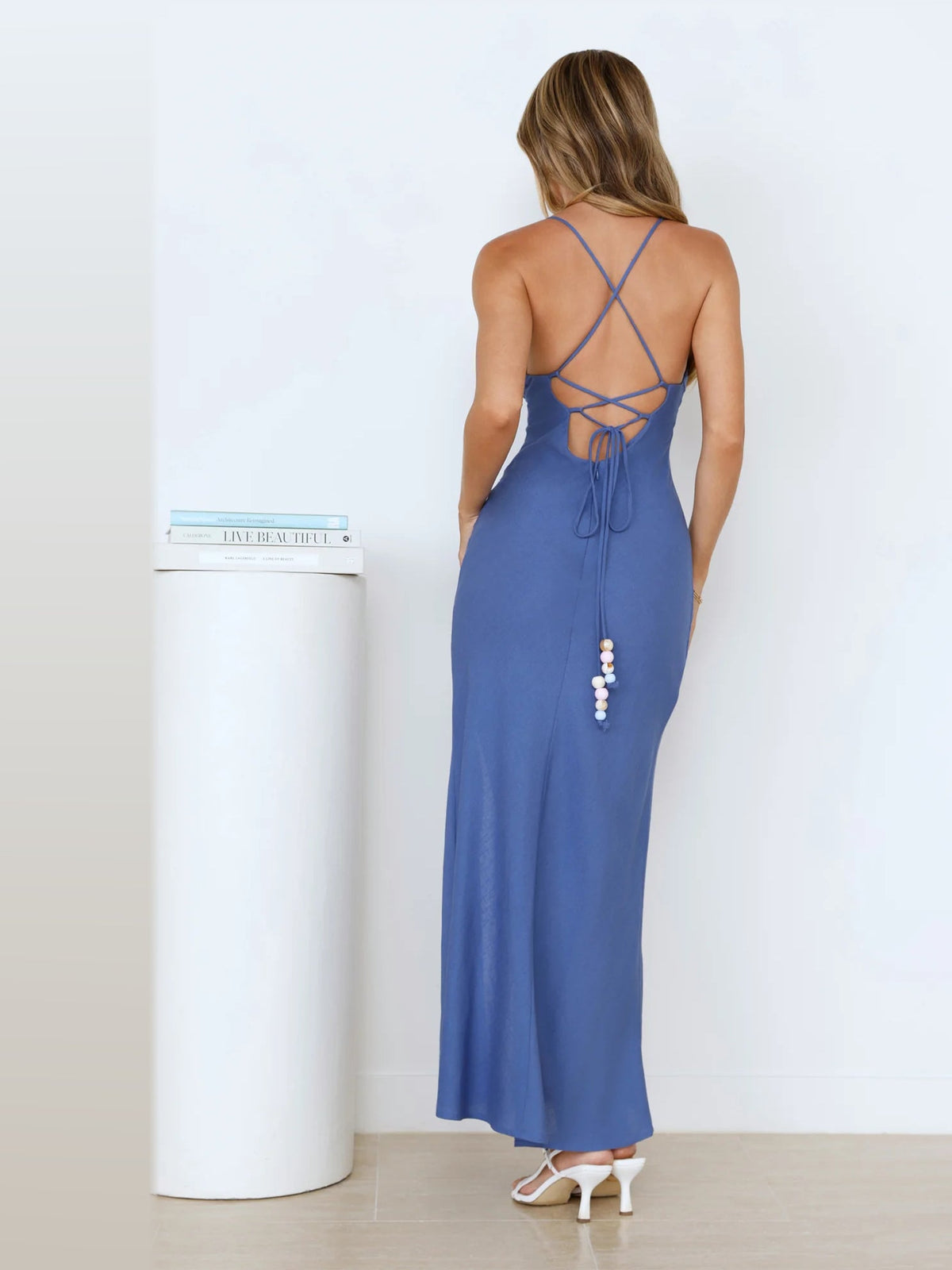 Blue maxi formal dress, back full-length view showing the bodice