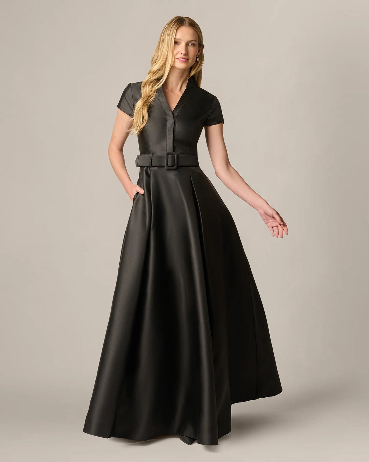 Black V-neck A-line maxi dress with short sleeves and belt, side-facing full view
