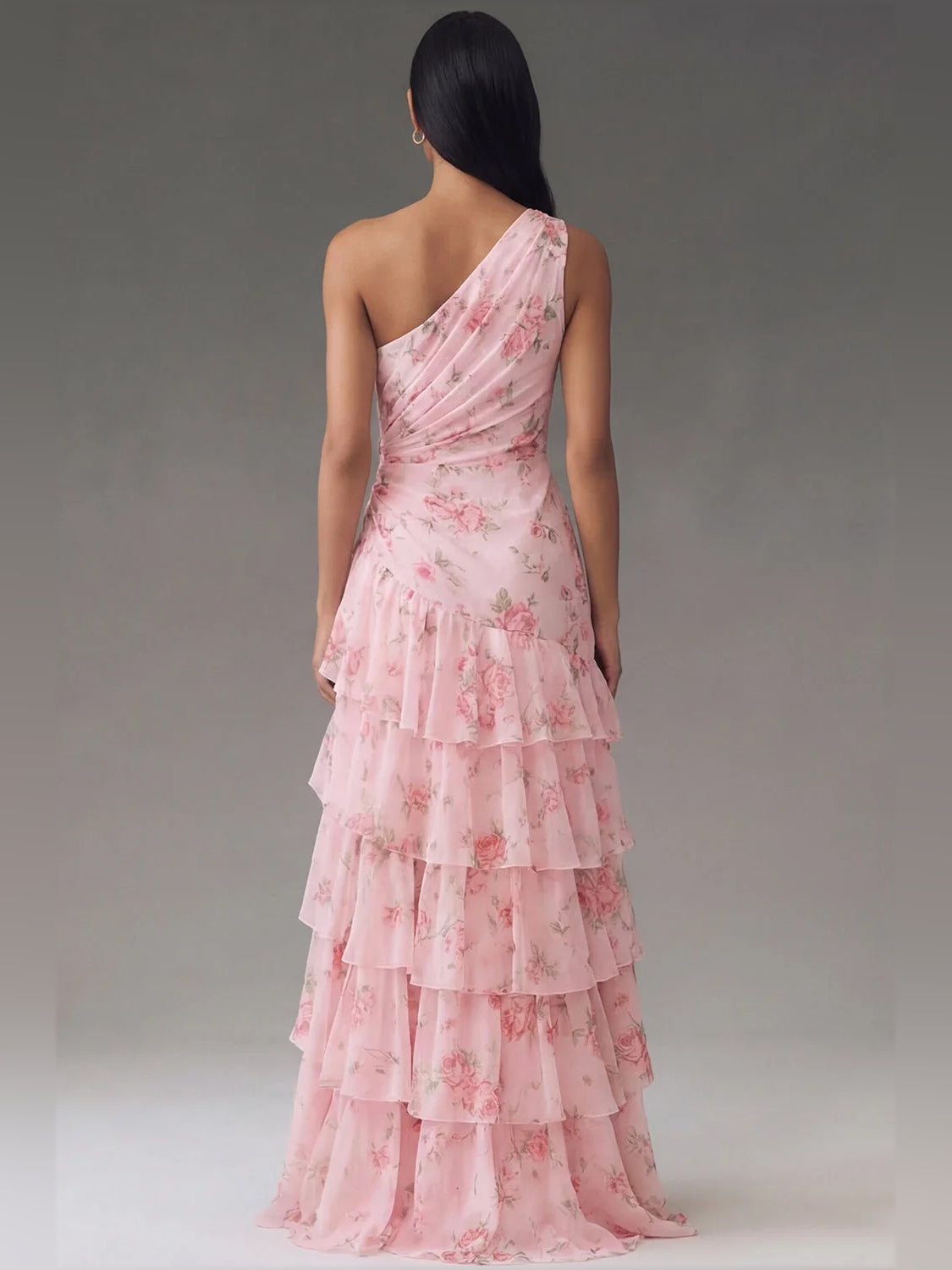 Light pink floral one-shoulder tiered maxi chiffon dress with ruffled layers from back view