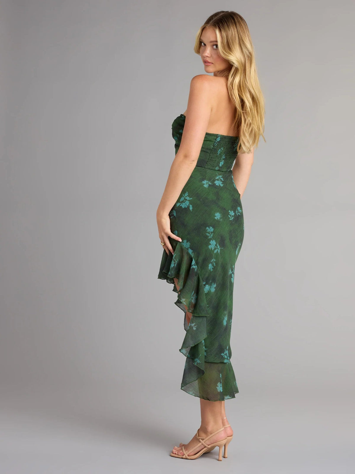 Dark green floral strapless midi dress with layered ruffled skirt and side slit