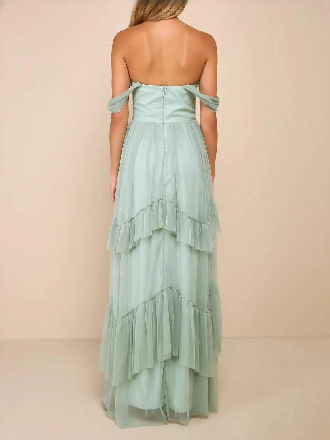 Mint green off-shoulder A-line tulle bridesmaid dress with tied straps and tiered ruffles
