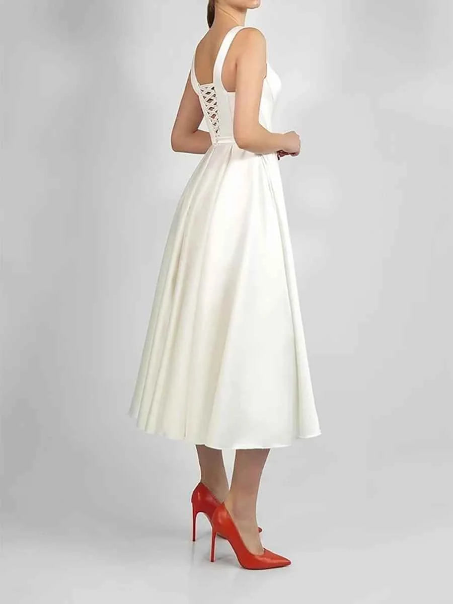 White satin A-line midi bridesmaid dress with lace-up corset back and sleeveless scoop neck