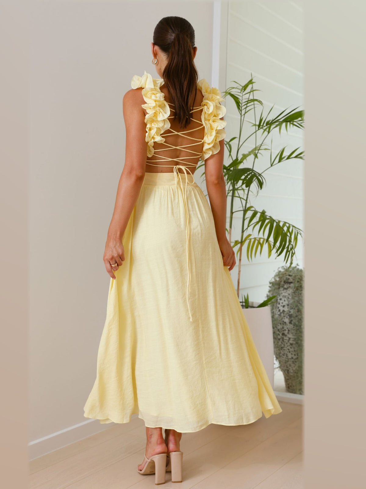 Yellow maxi formal dress, back full-length view showing the bodice