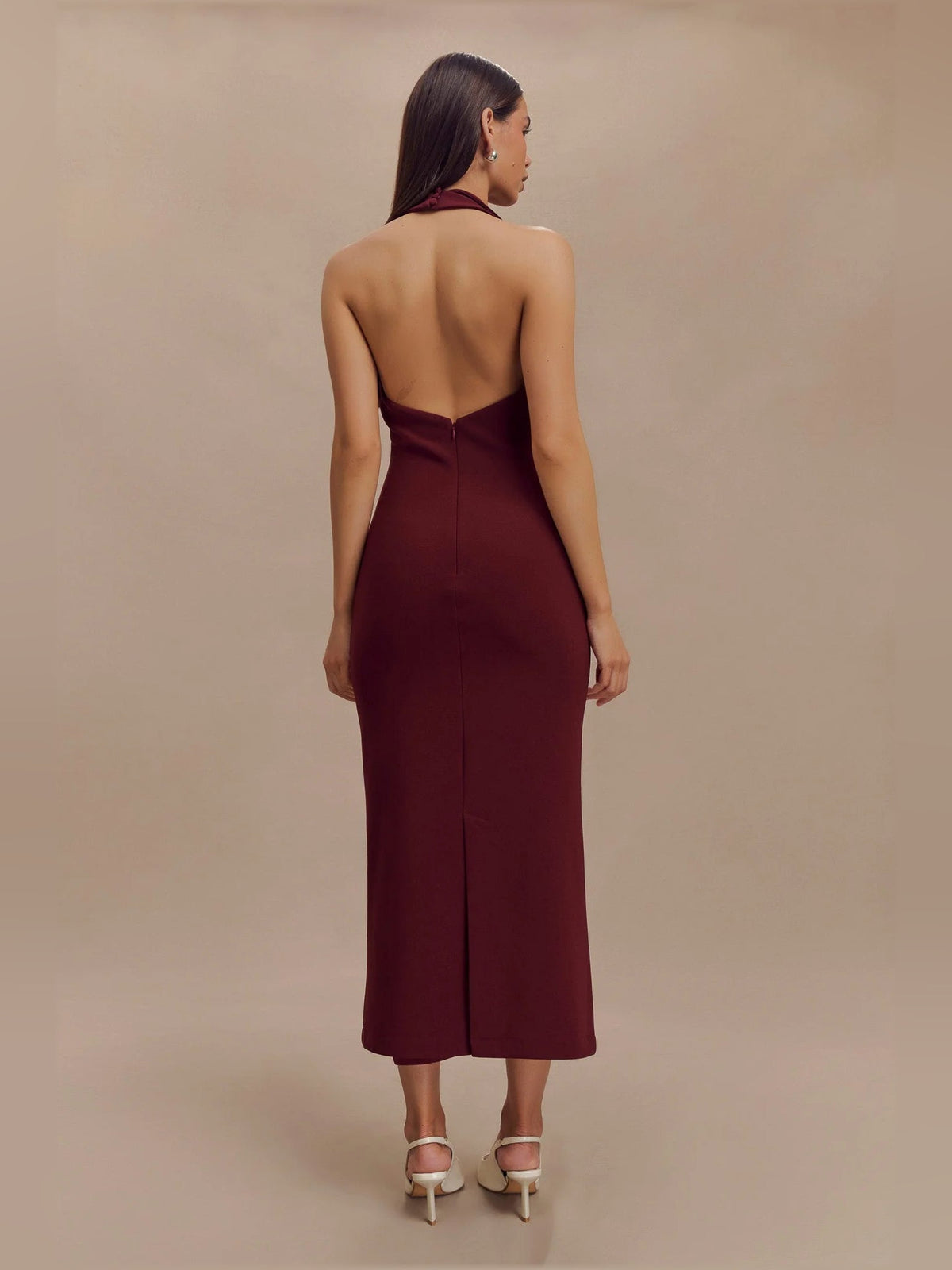 Merlot crepe halter midi dress with open-back V and fitted silhouette
