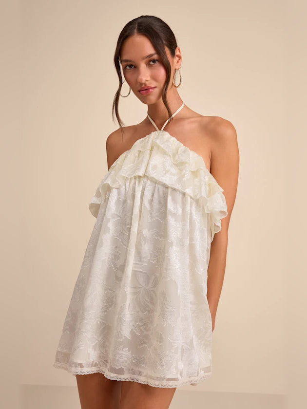 Ivory floral halter mini dress with tiered ruffle neckline and lace pattern