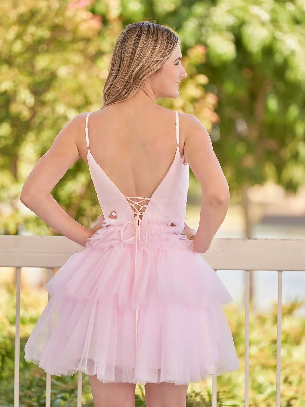 Blush pink mini tulle dress back, crisscross lace-up, spaghetti straps, tiered ruffle skirt