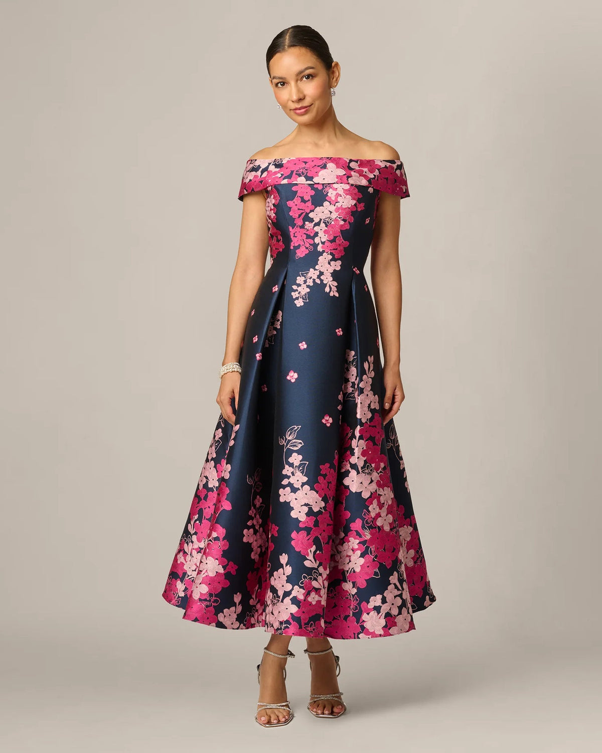 Off-shoulder A-line maxi dress with pink floral print on navy base