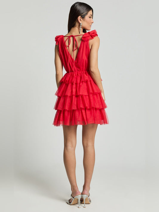 Red tiered tulle mini dress with open back and crisscross lacing, ruffle shoulder accents