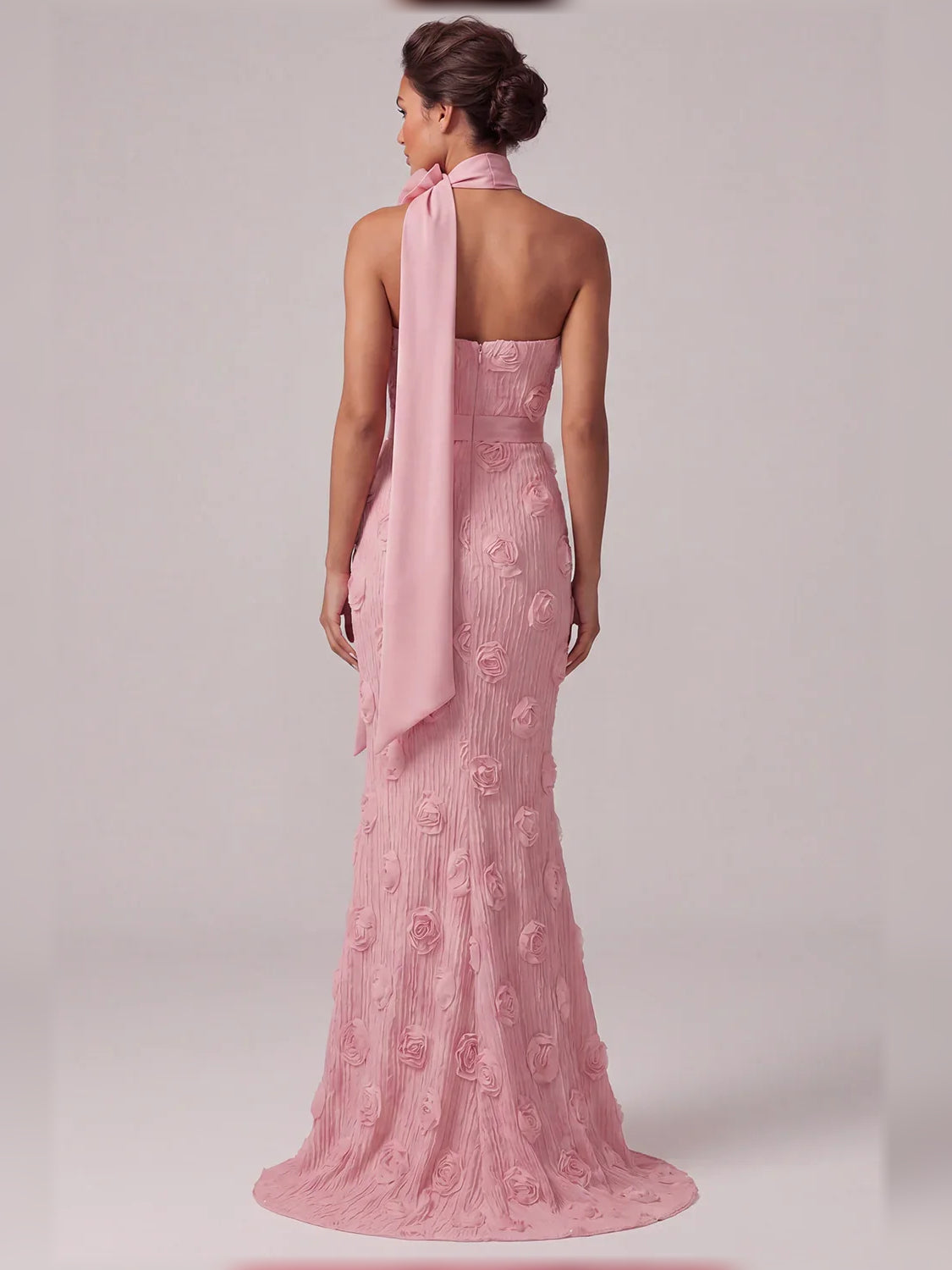 Light pink strapless mermaid gown, backless with long satin bow ribbon and rose applique