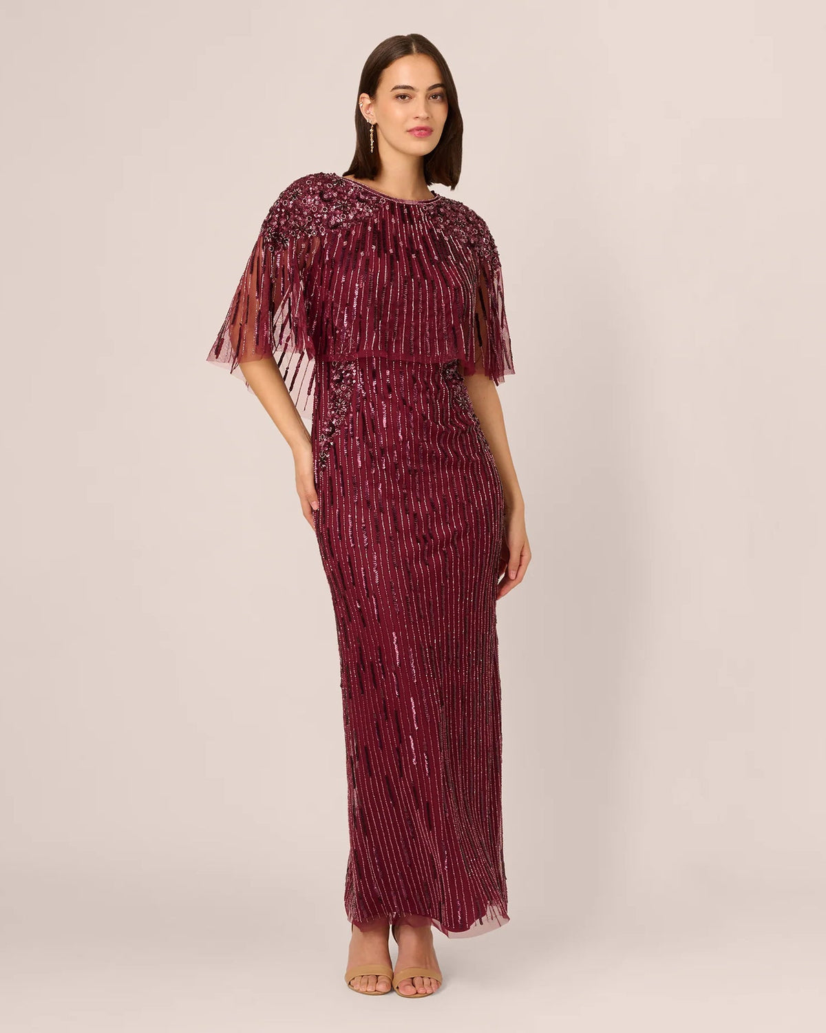 Burgundy sequined sheath maxi dress with short fringe sleeves and side slit